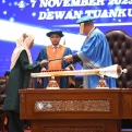 MOURNING MOTHER RECEIVES THE DEGREE OF LATE YOUNGEST CHILD